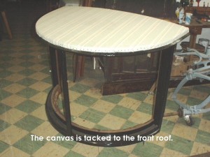 Canvas is tacked to the roof