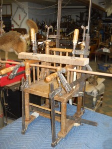 Repairing chairs is very difficult. Chairs are made with frames and streachers that are on angles. making clamping tricky. Also all mortis and dowell joints must be cleaned and wrasped prior to repair to remove the old glue.