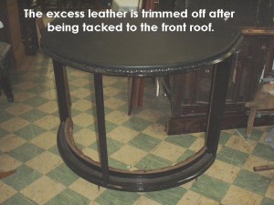 Excess leather is trimmed off