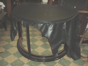 Leather is tacked to the front roof