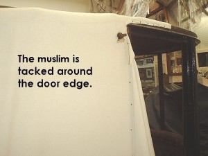 Muslim tacked around door