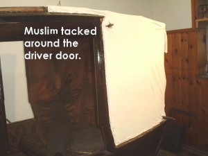 Muslim tacked around driver door